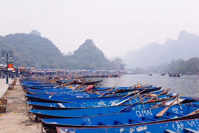 Boats parked at the foot of the mountain